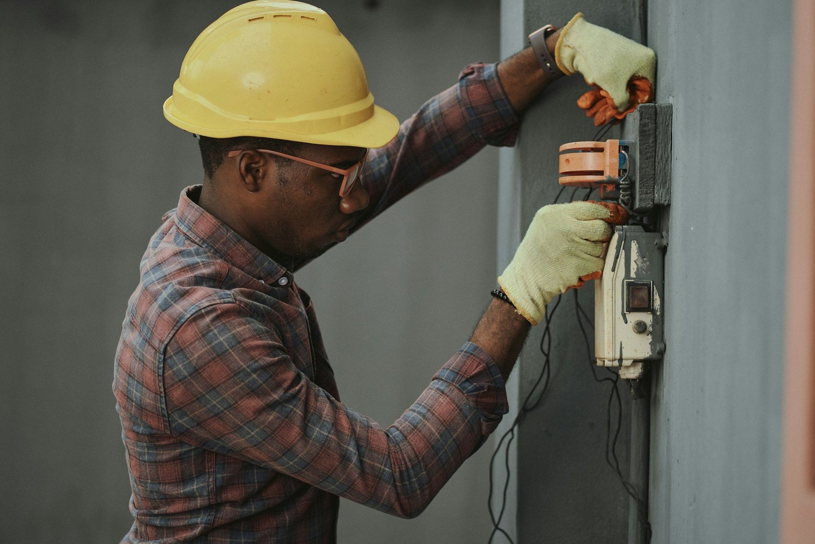 Electrician installing wiring